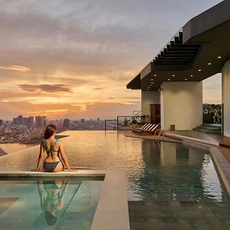 The Peninsula Phnom Penh Hotel Exterior photo