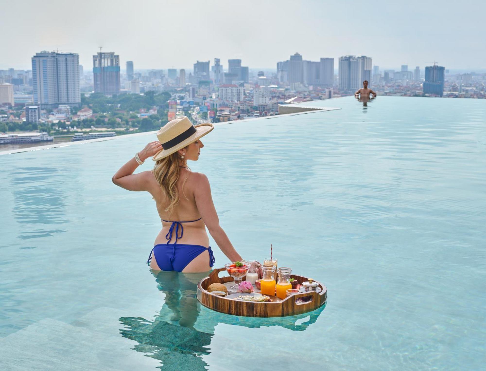 The Peninsula Phnom Penh Hotel Exterior photo